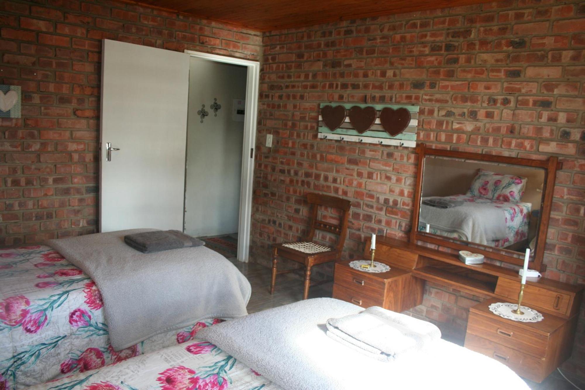 Suikerbosskuur Rondavel & Chalet Amsterdam ภายนอก รูปภาพ